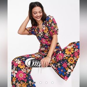 ASOS DESIGN bubble crepe V-neck puff sleeve jumpsuit in ditsy floral